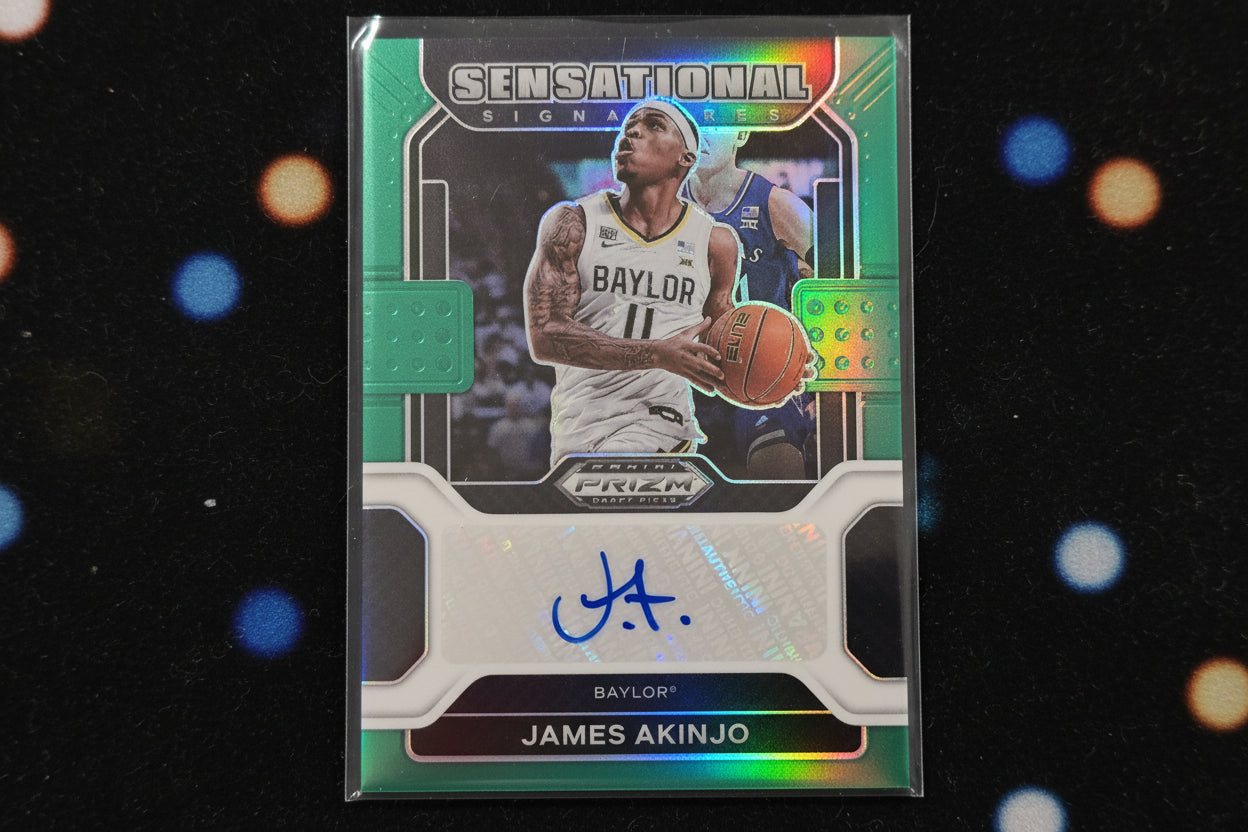 James Akinjo Signed Green Holo
